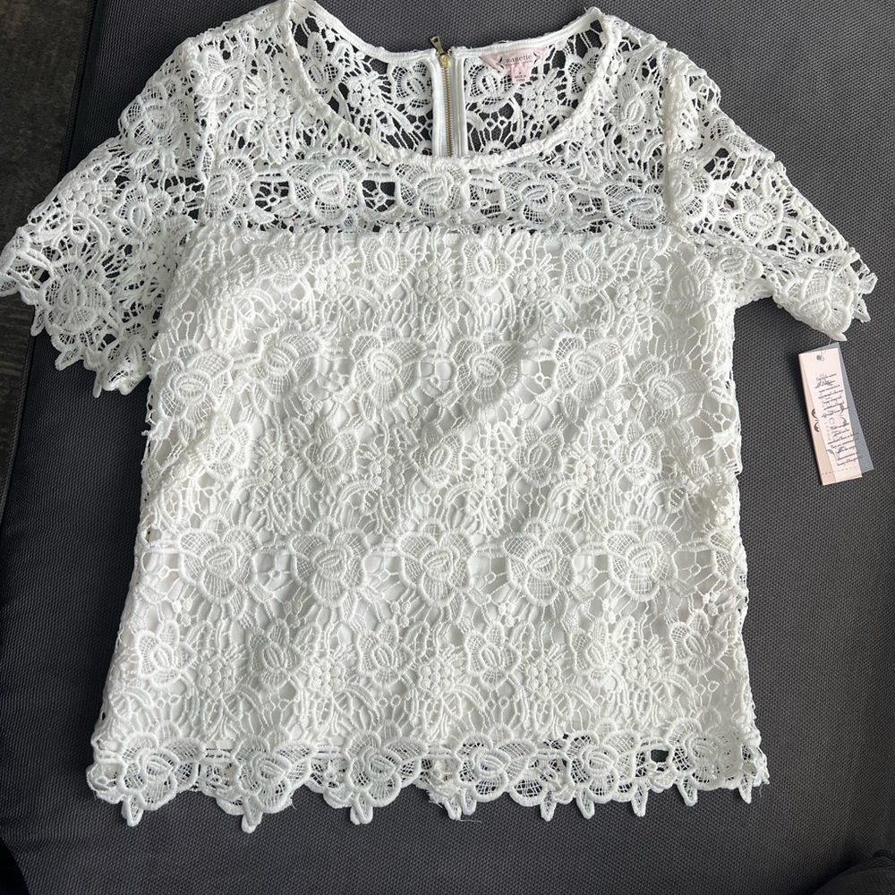 Nanette Lepore beautiful lace top with back zi detail - size M
